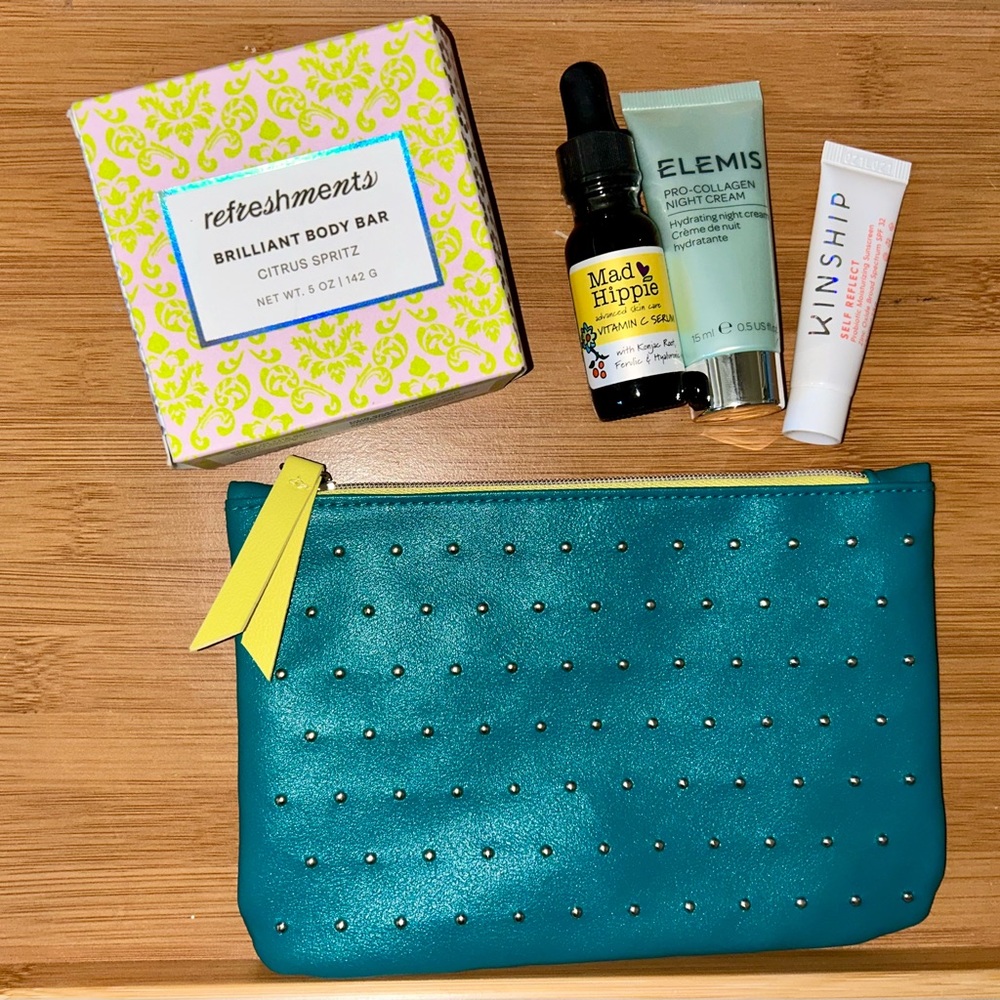 Bundle of variety of travel size skincare products and Ipsy bag